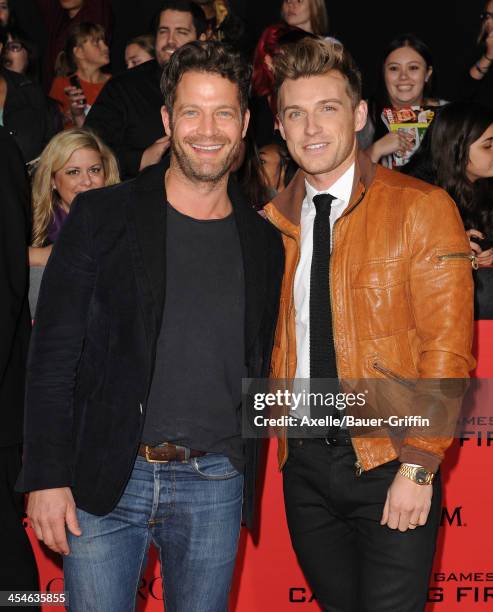 Personality Nate Berkus and Jeremiah Brent arrive at the Los Angeles Premiere of 'The Hunger Games: Catching Fire' at Nokia Theatre L.A. Live on...