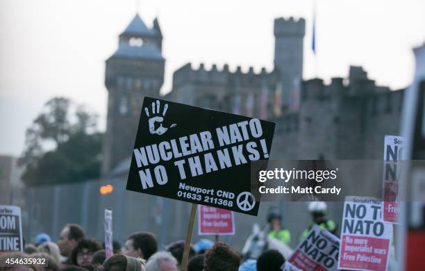 Anti-Nato protestors demonstrate outside Cardiff Castle that is hosting a Nato leaders dinner during the Nato Summit on September 4, 2014 in Cardiff,...