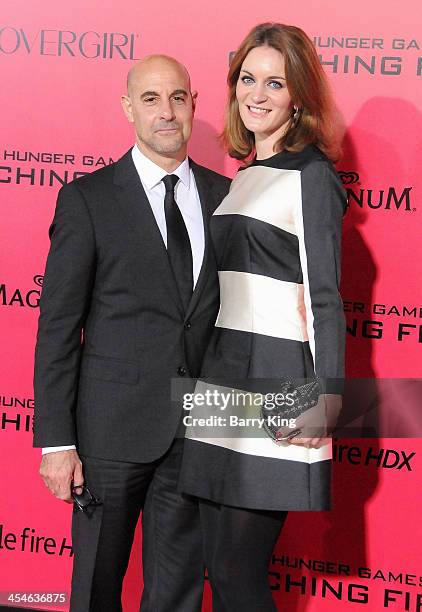 Actor Stanley Tucci and his wife/literary agent Felicity Blunt arrive at the Los Angeles Premiere 'The Hunger Games: Catching Fire' on November 18,...