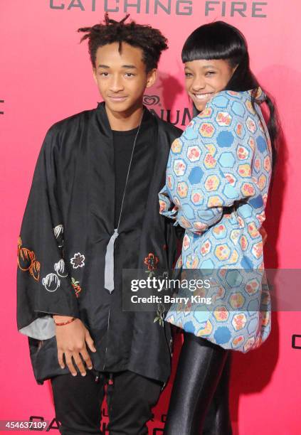 Actor Jaden Smith and actress sister Willow Smith arrive at the Los Angeles Premiere 'The Hunger Games: Catching Fire' on November 18, 2013 at Nokia...