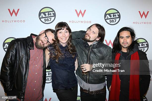 Brian Aubert, Nikki Monninger, Christopher Guanlao and Joe Lester of Silversun Pickups attend The ALTimate Rooftop Christmas party held at W...