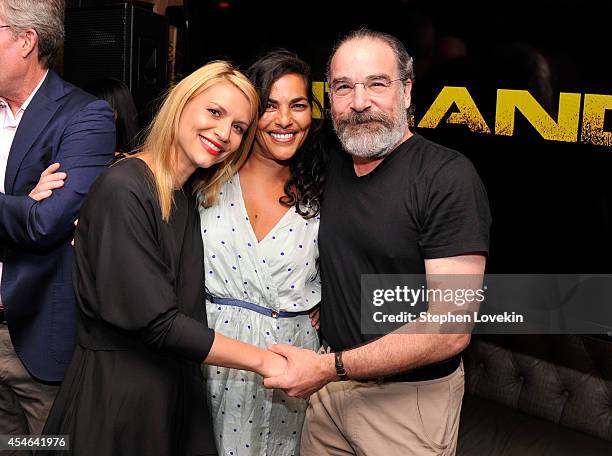 Claire Danes, Sarita Choudhury and Mandy Patinkin attend a Private Reception And Screening Of Homeland Season 4 on September 4, 2014 in New York City.