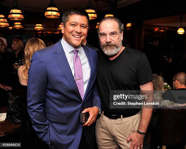 Carl Quintanilla and Mandy Patinkin attend a Private Reception And Screening Of Homeland Season 4 on September 4, 2014 in New York City.