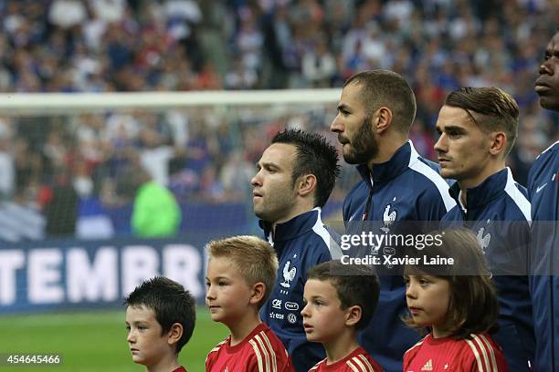 Mathieu Valbuena, Karim Benzema and Antoine Griezmann of France during the International Friendly match between France and Spain at Stade de France...