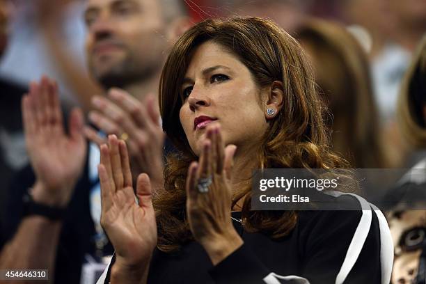 Wife Mirka Federer watches her husband Roger Federer of Switzerland play against Gael Monfils of France during their men's singles quarterfinal match...