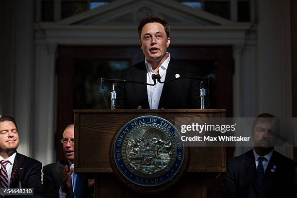 Elon Musk, CEO of Tesla Motors, speaks at a press conference at the Nevada State Capitol, September 4, 2014 in Carson City, Nevada. Musk and Sandoval...