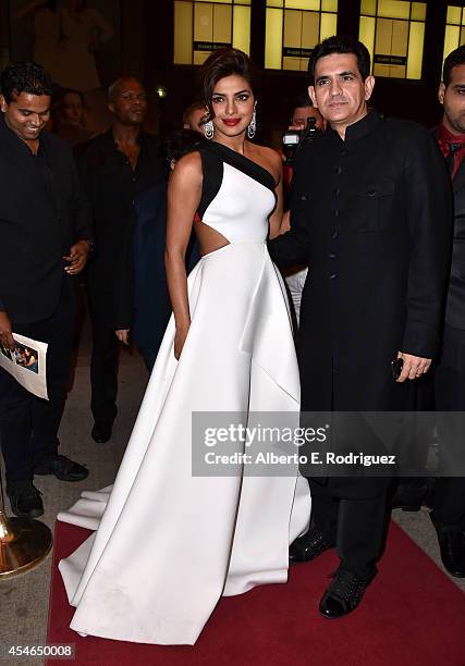 Actress Priyanka Chopra and director Omung Kumar attend the "Mary Kom" premiere during the 2014 Toronto International Film Festival at The Elgin on...