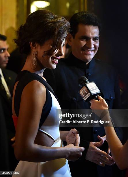 Actress Priyanka Chopra and director Omung Kumar attend the "Mary Kom" premiere during the 2014 Toronto International Film Festival at The Elgin on...