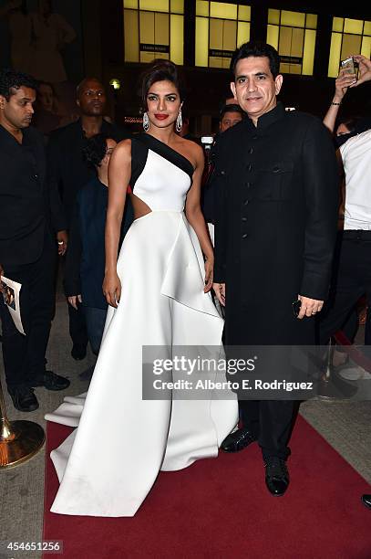 Actress Priyanka Chopra and director Omung Kumar attend the "Mary Kom" premiere during the 2014 Toronto International Film Festival at The Elgin on...