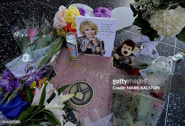 Flowers are placed on the Hollywood Walk of Fame Star for Joan Rivers in Hollywood, California on September 4 following news of the comedian's death...