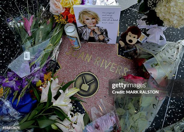 Flowers are placed on the Hollywood Walk of Fame Star for Joan Rivers in Hollywood, California on September 4 following news of the comedian's death...