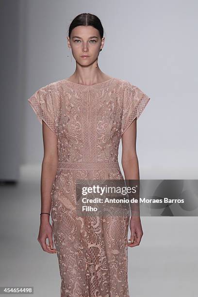 Model walks the runway during the Tadashi Shoji show during Mercedes-Benz Fashion Week Spring 2015 at The Salon at Lincoln Center on September 4,...