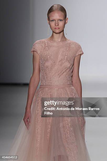 Model walks the runway during the Tadashi Shoji show during Mercedes-Benz Fashion Week Spring 2015 at The Salon at Lincoln Center on September 4,...