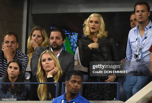 Lindsey Vonn (2nd L Front and Gwen Stefani watch the match between Gael Monfils of France and Roger Federer of Switzerland during their US Open 2014...