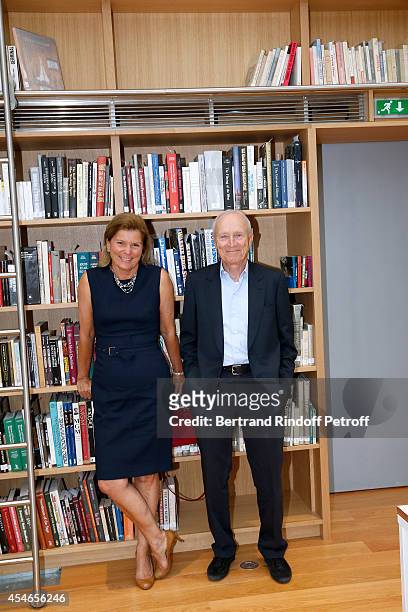 Pathe Jerome Seydoux and his wife CEO of the 'Jerome Seydoux - Pathe Foundation' Sophie Seydoux pose in the library during the 'Jerome Seydoux -...