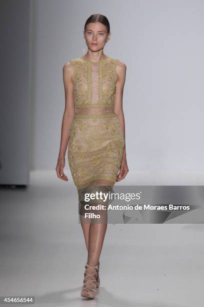 Model walks the runway during the Tadashi Shoji show during Mercedes-Benz Fashion Week Spring 2015 at The Salon at Lincoln Center on September 4,...