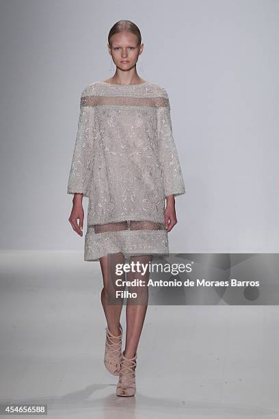 Model walks the runway during the Tadashi Shoji show during Mercedes-Benz Fashion Week Spring 2015 at The Salon at Lincoln Center on September 4,...