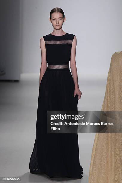 Model walks the runway during the Tadashi Shoji show during Mercedes-Benz Fashion Week Spring 2015 at The Salon at Lincoln Center on September 4,...