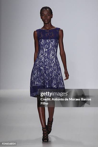 Model walks the runway during the Tadashi Shoji show during Mercedes-Benz Fashion Week Spring 2015 at The Salon at Lincoln Center on September 4,...