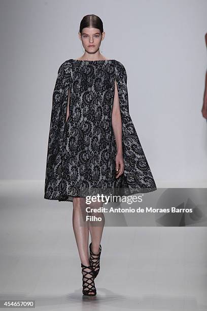 Model walks the runway during the Tadashi Shoji show during Mercedes-Benz Fashion Week Spring 2015 at The Salon at Lincoln Center on September 4,...