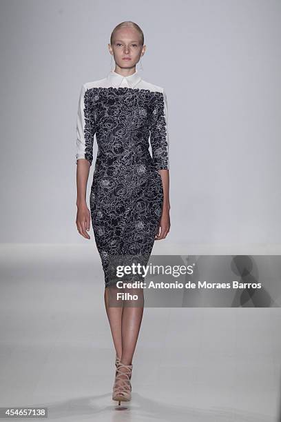 Model walks the runway during the Tadashi Shoji show during Mercedes-Benz Fashion Week Spring 2015 at The Salon at Lincoln Center on September 4,...