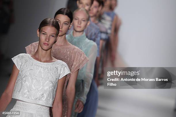 Model walks the runway during the Tadashi Shoji show during Mercedes-Benz Fashion Week Spring 2015 at The Salon at Lincoln Center on September 4,...