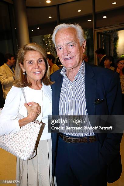 Journalist Philippe Labro and his wife attend the 'Jerome Seydoux - Pathe Foundation' : Opening party on September 4, 2014 in Paris, France.