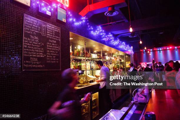 Guests are served at the bar in Slowdown at 729 N 14th St. Omaha, Nebraska, on Saturday, August 30, 2014.