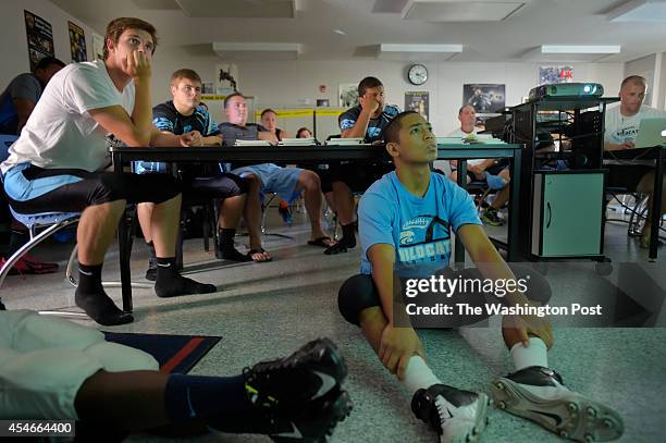 Centreville DE Sean Culleiton, left, and linebacker Riel Simpao , right, watch film of the Gonzaga offense as number one Centreville prepares for a...