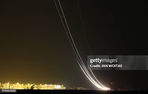 An Antonov cargo plane carrying military equipment onboard takes off from the Leipzig/Halle airport in Schkeuditz, eastern Germany, on early...