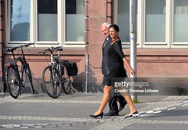 Former co- chairman of German party's Die Linke Oskar Lafontaine and Sahra Wagenknecht arrive for a service of commemoration for Frank Schirrmacher...