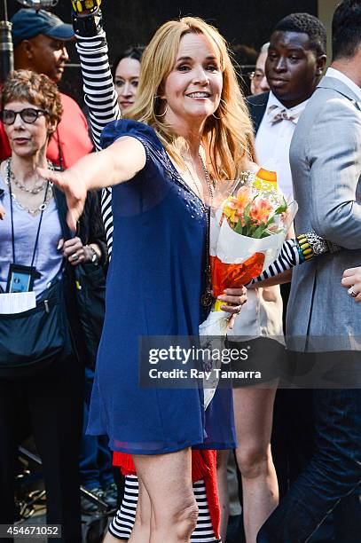 Actress Lea Thompson leaves the "Good Morning America" taping at the ABC Times Square Studios on September 4, 2014 in New York City.