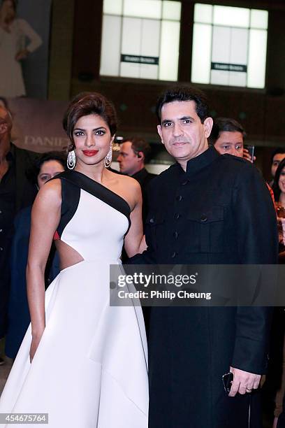 Actress Priyanka Chopra and Director Omung Kumar arrive at the premiere for "Mary Kom" during the 2014 Toronto International Film Festival at The...