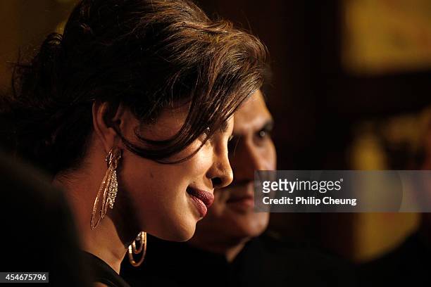 Actress Priyanka Chopra and Director Omung Kumar arrive at the premiere for "Mary Kom" during the 2014 Toronto International Film Festival at The...