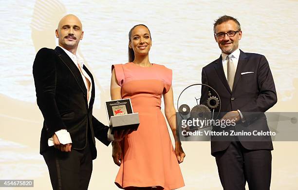 Actor James Franco as he receives the LeCoultre Glory To The Filmmaker 2014 Award with Carmen Chaplin and Laurent Vinay during the 71st Venice Film...