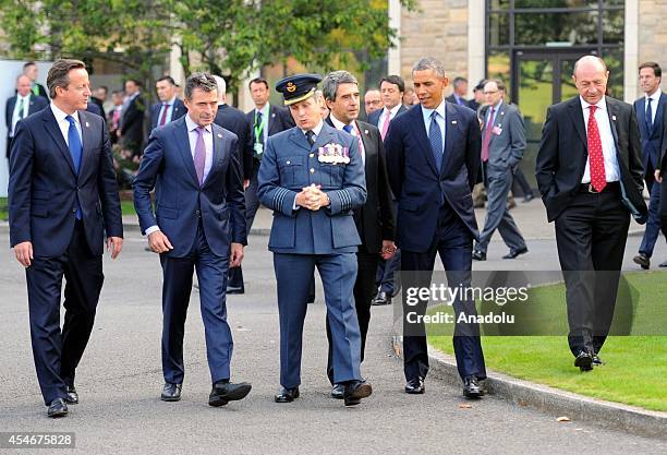 President Barack Obama , British Prime Minister David Cameron , President of Romania Traian Basesku and NATO Secretary General Anders Fogh Rasmussen...