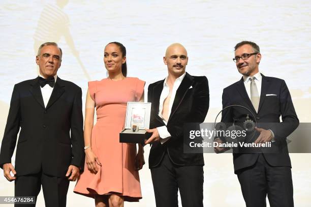 James Franco poses with his award for Jaeger-LeCoultre Glory to the Filmmaker 2014 with director of the Venice Film Festival Alberto Barbera ,Carmen...