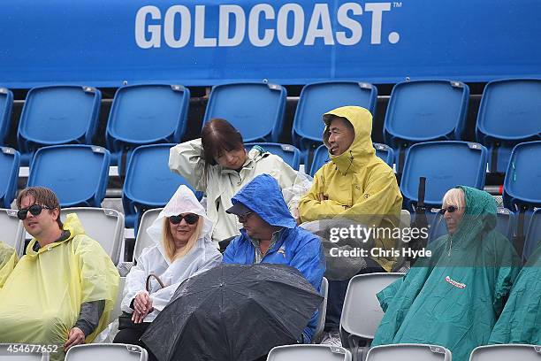 Spectators watch from the stands during day two of the 2014 Pan Pacific Championships at Gold Coast Aquatics on August 22, 2014 in Gold Coast,...