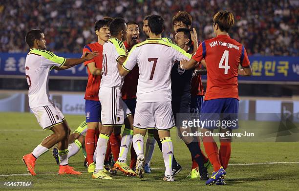 Cha Duri of South Korea argue with Nicolas Fedor of Venezuela during the international friendly match between South Korea and Venezuela at Bucheon...