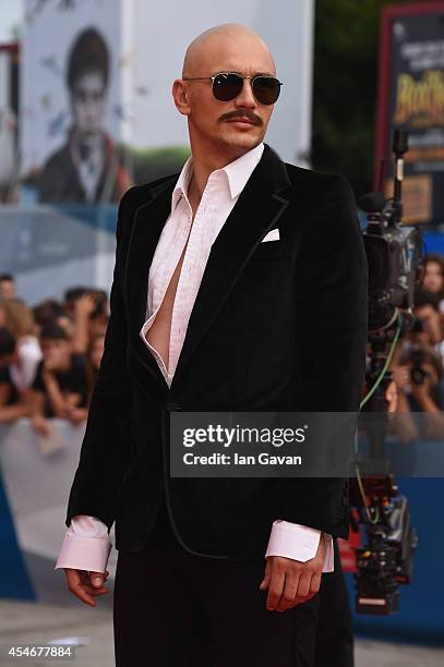 Director and actor James Franco arrives for the 'The Sound and the Fury' Premiere before receiving the JLC Glory To The Filmmaker 2014 Award during...