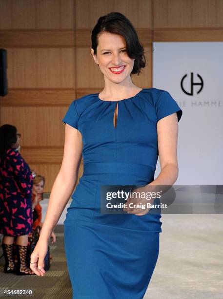 Model walks the runway at the Fashion Law Institute fashion show during Mercedes-Benz Fashion Week Spring 2015 at Fordham Law School on September 5,...