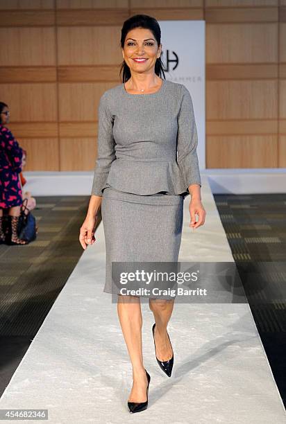 Model walks the runway at the Fashion Law Institute fashion show during Mercedes-Benz Fashion Week Spring 2015 at Fordham Law School on September 5,...