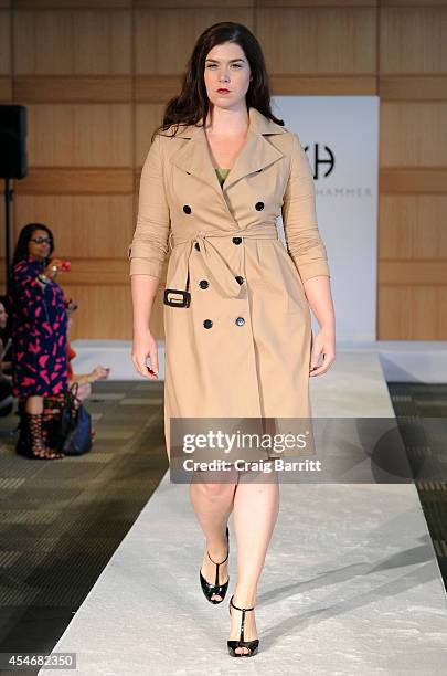 Model walks the runway at the Fashion Law Institute fashion show during Mercedes-Benz Fashion Week Spring 2015 at Fordham Law School on September 5,...