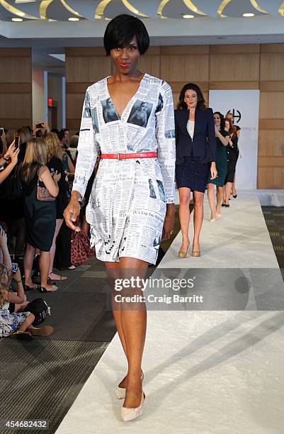 Models walk the runway at the Fashion Law Institute fashion show during Mercedes-Benz Fashion Week Spring 2015 at Fordham Law School on September 5,...