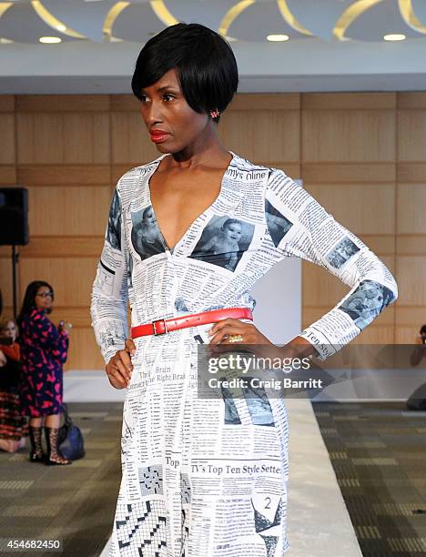 Model walks the runway at the Fashion Law Institute fashion show during Mercedes-Benz Fashion Week Spring 2015 at Fordham Law School on September 5,...