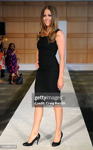 Model walks the runway at the Fashion Law Institute fashion show during Mercedes-Benz Fashion Week Spring 2015 at Fordham Law School on September 5,...