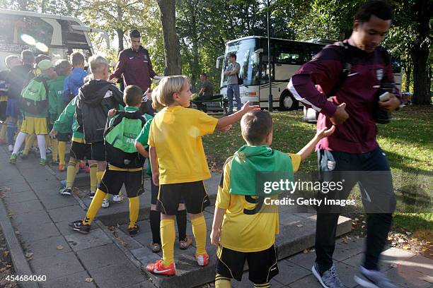 The childrens invites English team before the match at Dariaus ir Gireno Stadionas on September 5, 2014 in Kaunas, Lithuania.