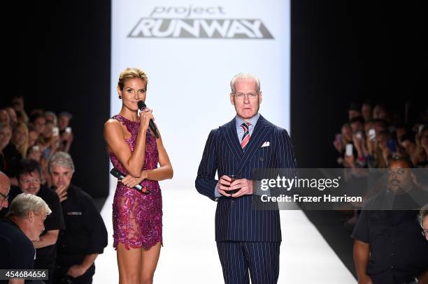 Heidi Klum and Tim Gunn walk the runway at the Project Runway fashion show during Mercedes-Benz Fashion Week Spring 2015 at The Theatre at Lincoln...