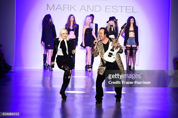 Fashion designers Estel Day and Mark Tango perform on the runway at the Mark And Estel fashion show during Mercedes-Benz Fashion Week Spring 2015 at...