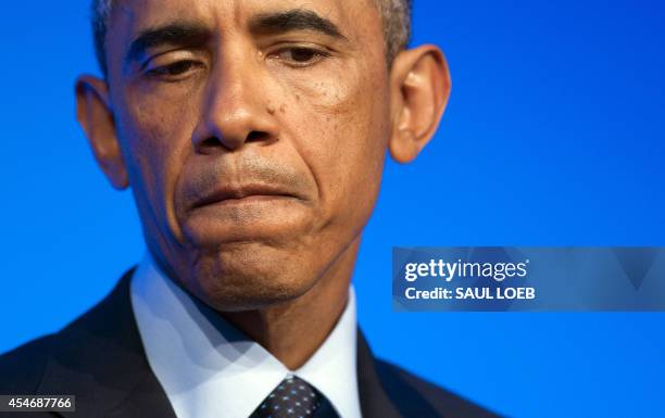 President Barack Obama speaks at a press conference on the second day of the NATO 2014 Summit at the Celtic Manor Resort in Newport, South Wales, on...